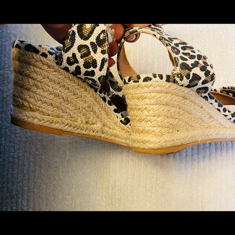 Leopard print wedged espadrilles.